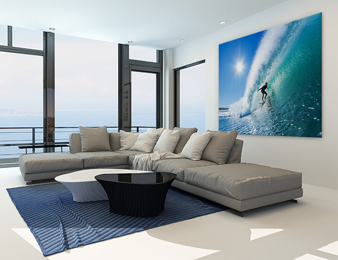 Surfer on blue ocean wave