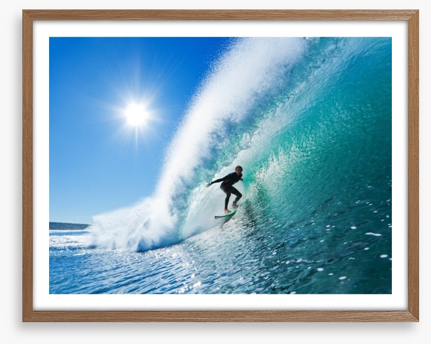 Surfer on blue ocean wave