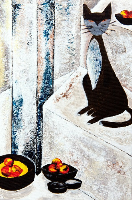 Chat noire avec les fruits