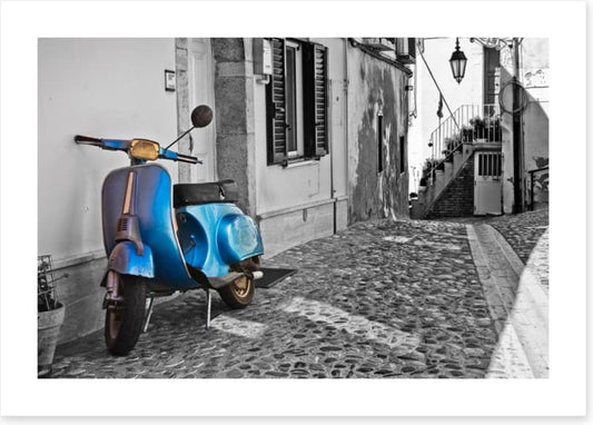 Moped in cobblestone alley, Italy