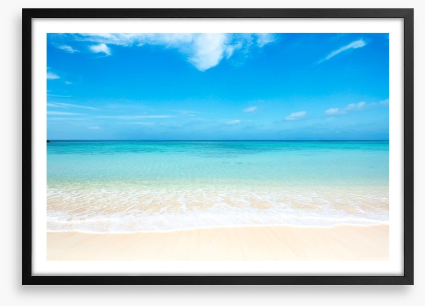 Blue skies white sand