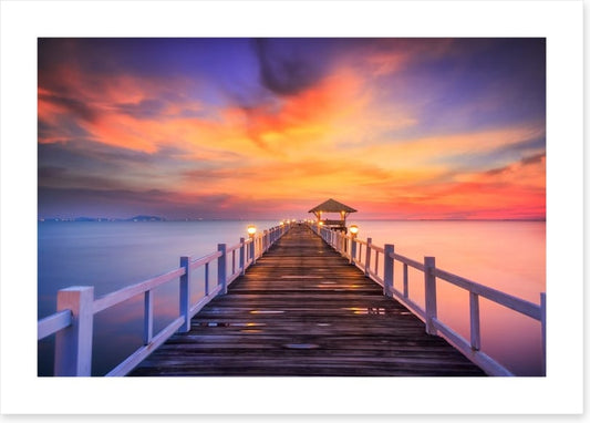 Fiery sunset across the pier