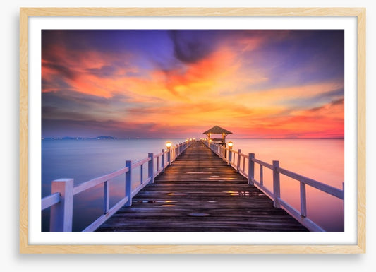 Fiery sunset across the pier