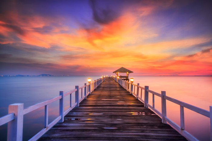 Fiery sunset across the pier