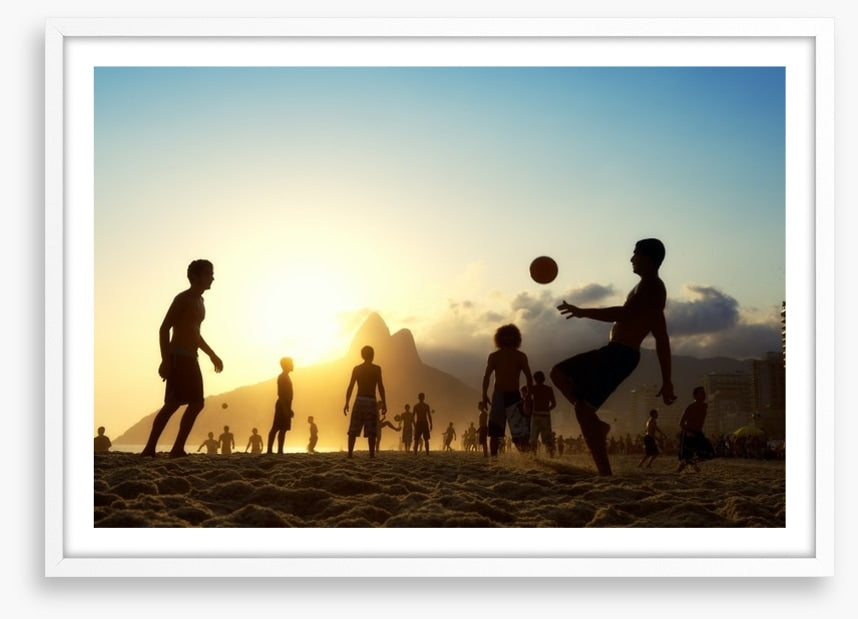 Beach football at sunset, Brazil