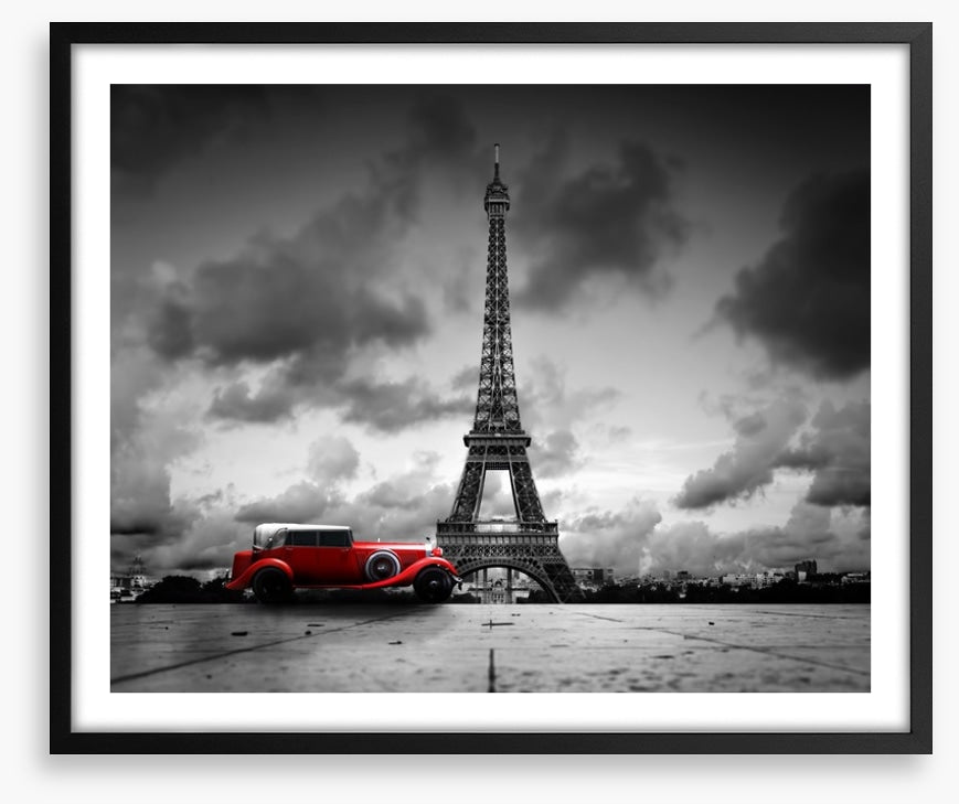 The Eiffel Tower and red car