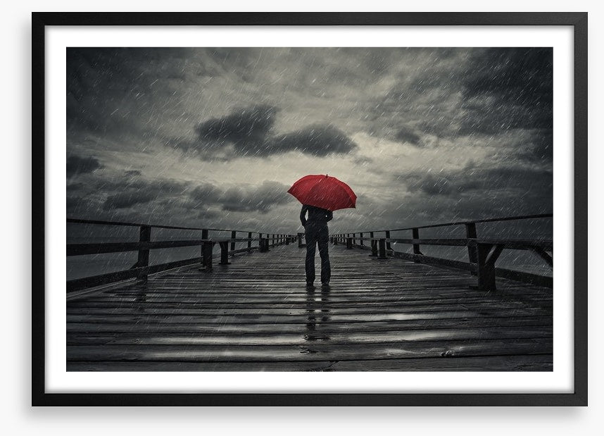 Red umbrella in the storm