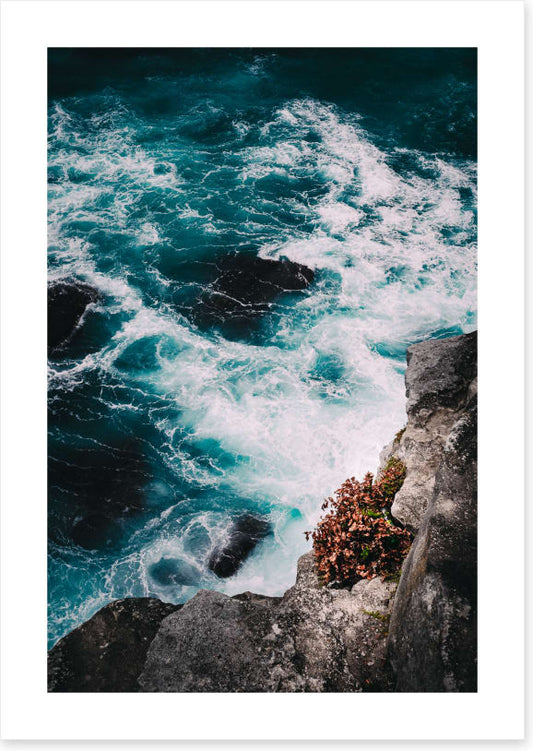 Below the ocean cliff