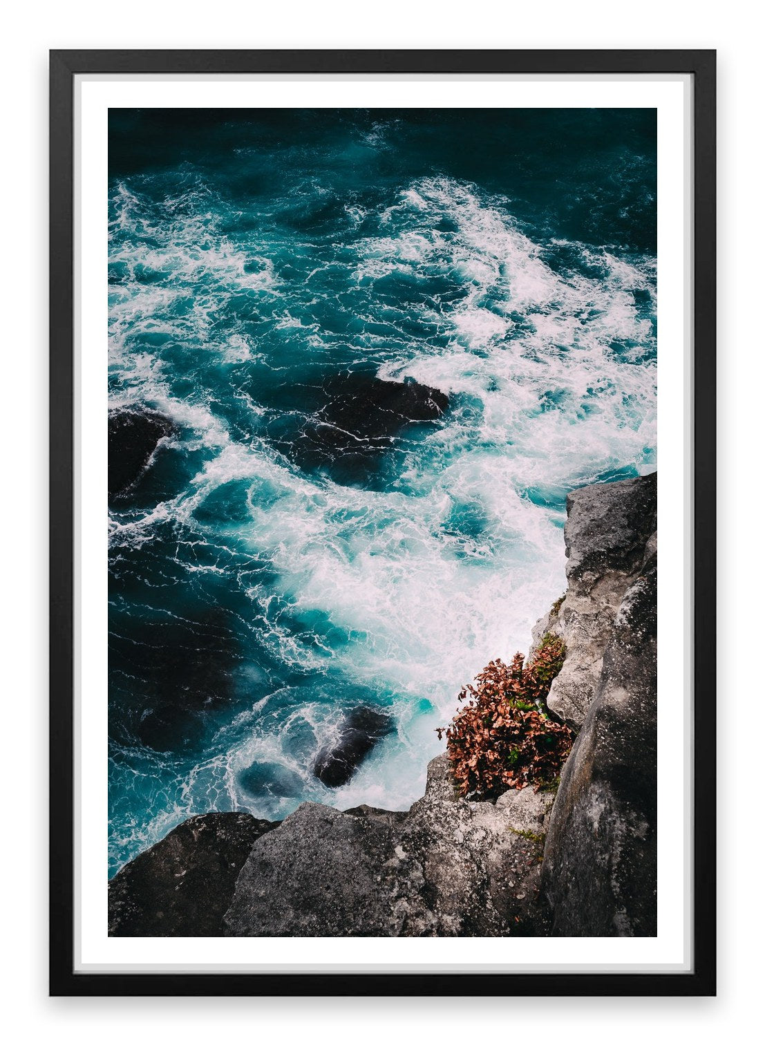 Below the ocean cliff