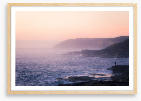 Lone rock fisherman