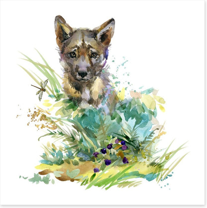 Wolf cub in the grass