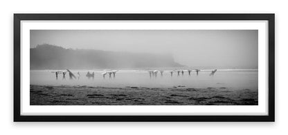 Surfers in the mist