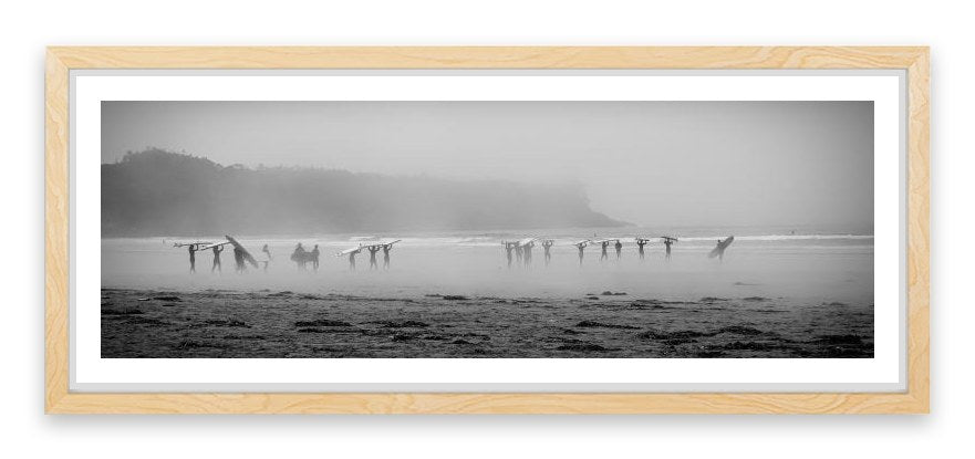 Surfers in the mist
