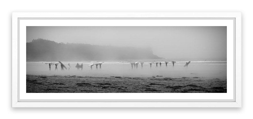 Surfers in the mist