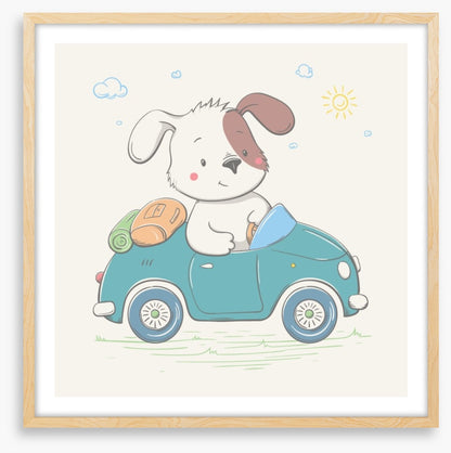 Puppy drives the car