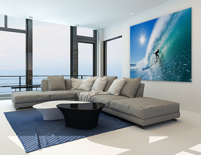 Surfer on blue ocean wave