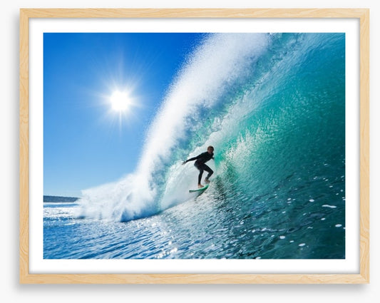 Surfer on blue ocean wave