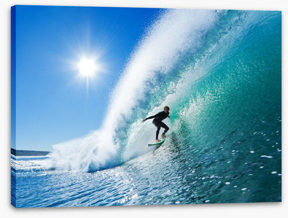 Surfer on blue ocean wave