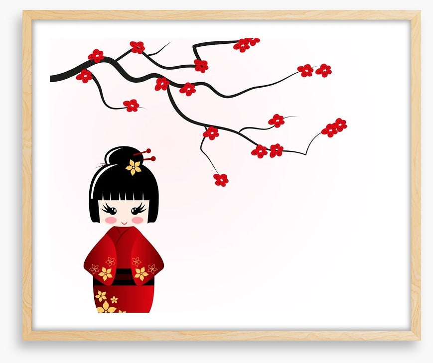 Kokeshi doll under sakura branch