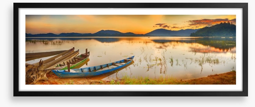 Rowing boats at sundown