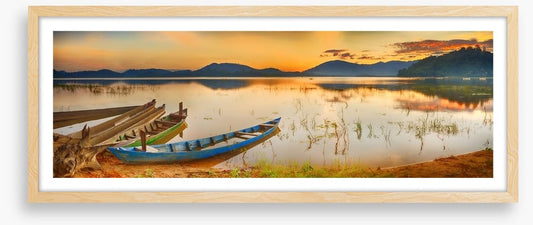 Rowing boats at sundown