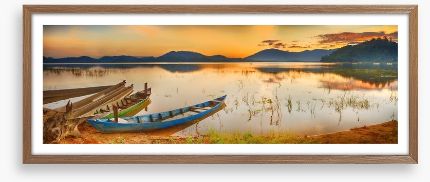Rowing boats at sundown