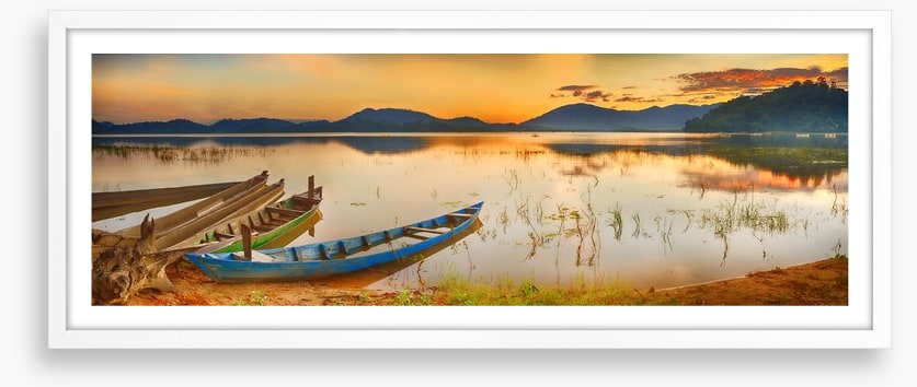 Rowing boats at sundown