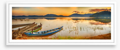 Rowing boats at sundown