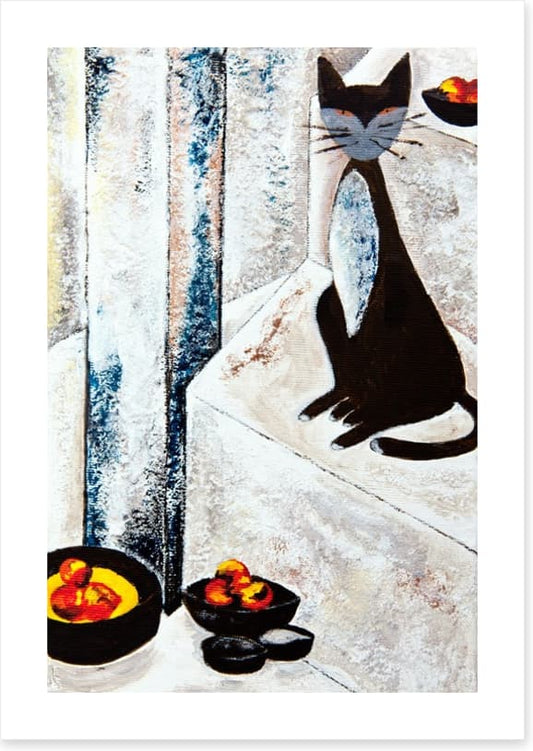 Chat noire avec les fruits