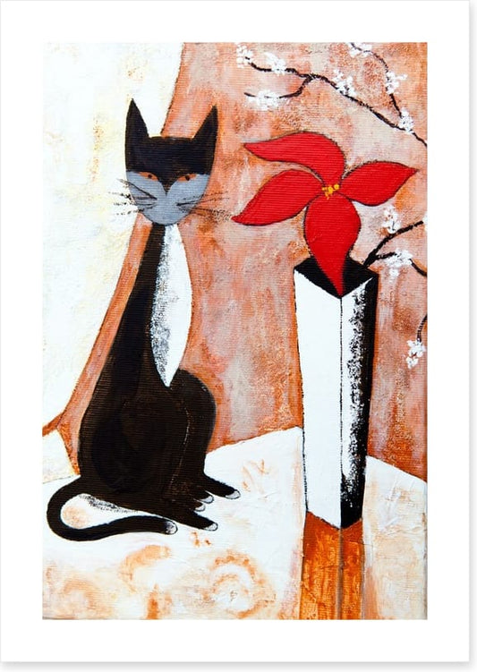 Chat noire avec un fleur