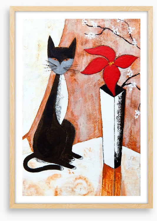 Chat noire avec un fleur