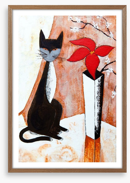 Chat noire avec un fleur