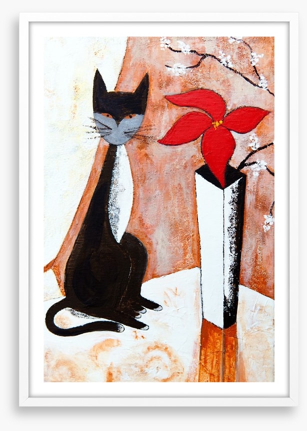 Chat noire avec un fleur