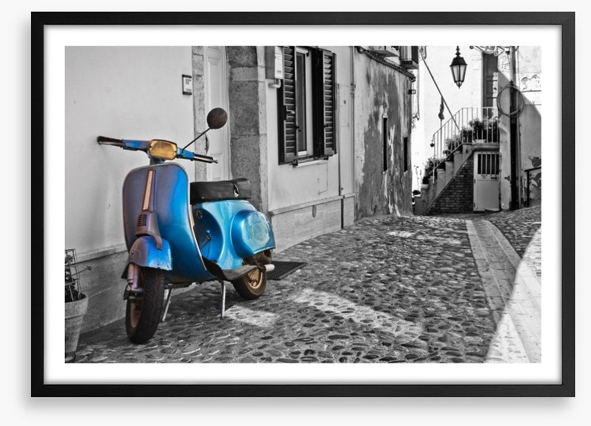 Moped in cobblestone alley, Italy