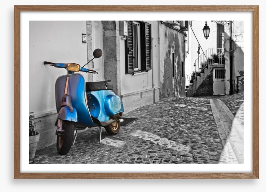 Moped in cobblestone alley, Italy