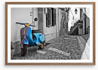 Moped in cobblestone alley, Italy