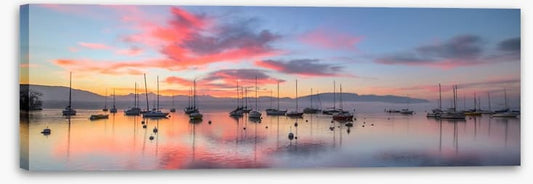 Sunrise and sailboats