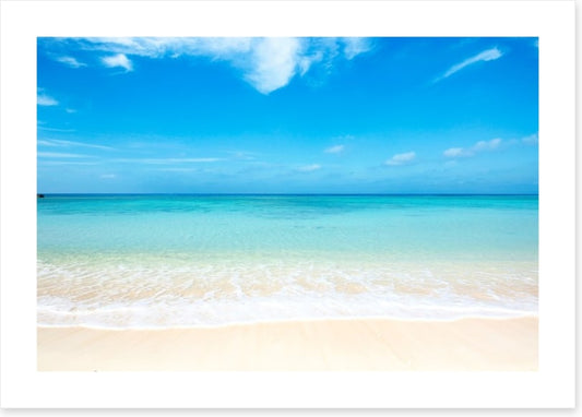 Blue skies white sand