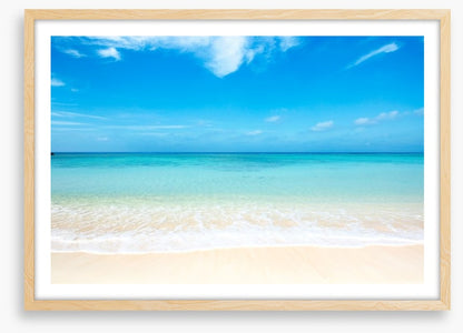 Blue skies white sand