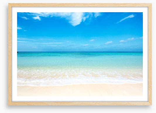 Blue skies white sand