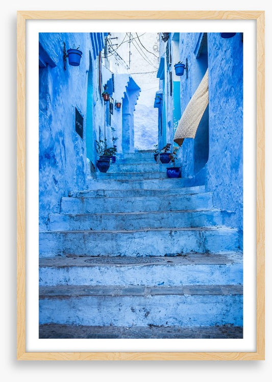 Below the blue steps