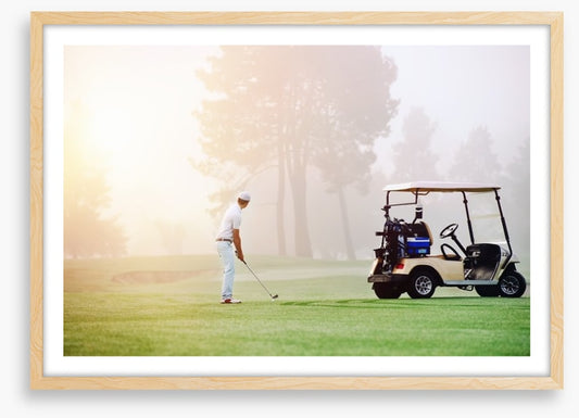Golfer in the mist