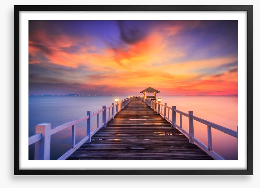 Fiery sunset across the pier