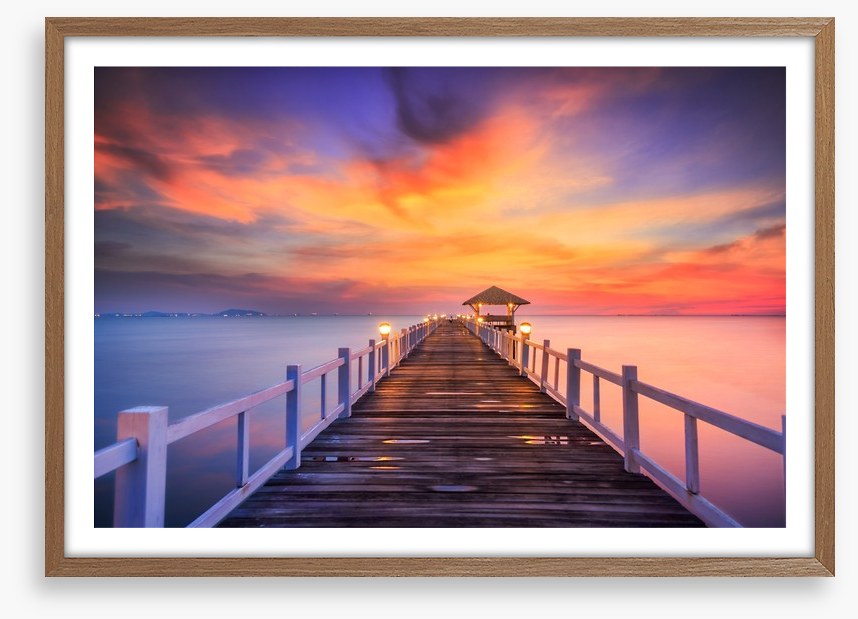 Fiery sunset across the pier