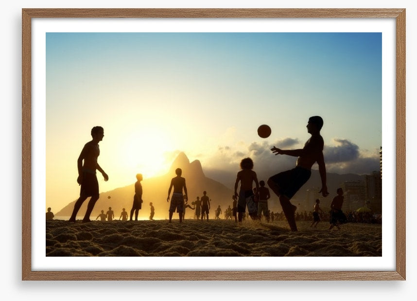 Beach football at sunset, Brazil