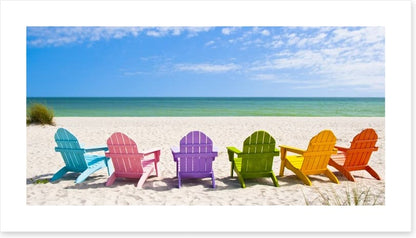 Rainbow chairs on a sunny beach