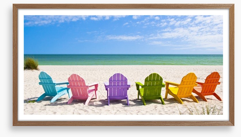 Rainbow chairs on a sunny beach