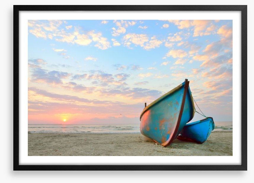 Blue boats at sunrise