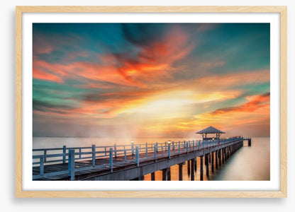 Dramatic pier sunset