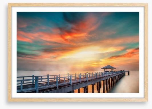 Dramatic pier sunset